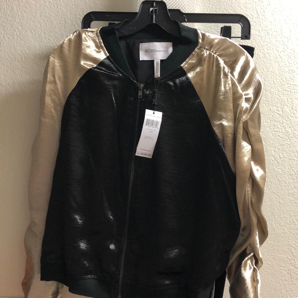 Bcbgeneration metallic black and gold jump suit.